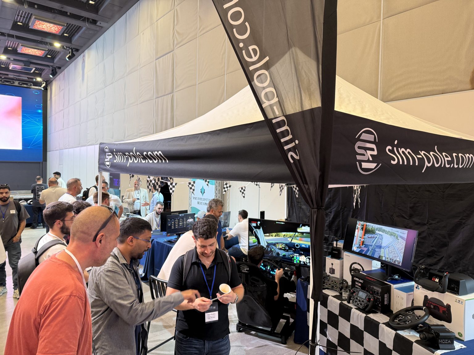 SimPole booth at a sim racing expo